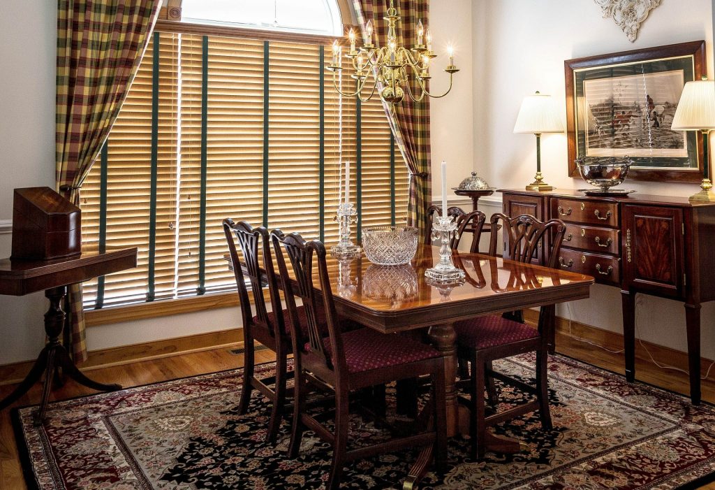 Dining room home interior with shades