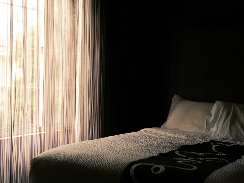 window shades help make a bedroom more cozy